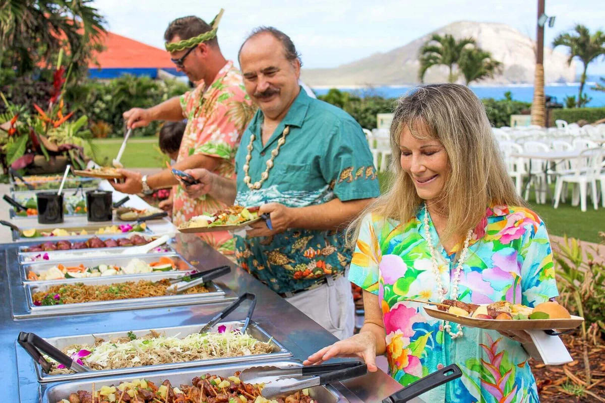 Guests enjoying the Hawaiian buffet at Aloha Kai Luau